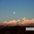 Nearly a full moonrise above Himalayas